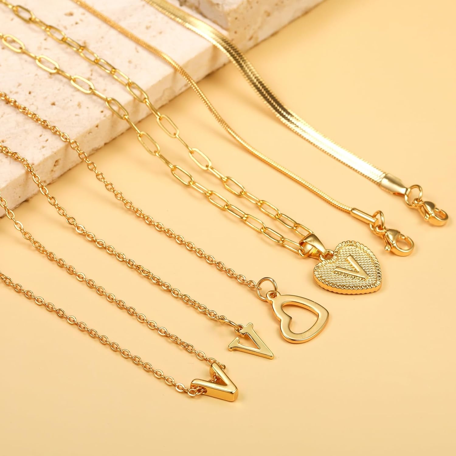 image:imageFAXHION Gold Initial Necklaces for Women 3 Pcs 14K Gold Plated Letter Heart Pendant Necklaces Dainty Gold Letter Necklace Set Layering Choker Necklace for GiftGold