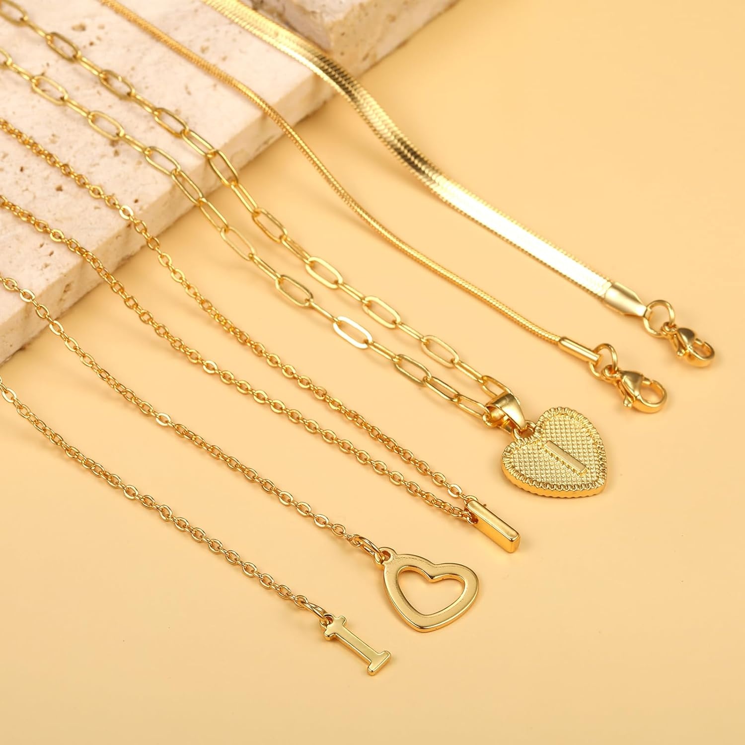 image:imageFAXHION Gold Initial Necklaces for Women 3 Pcs 14K Gold Plated Letter Heart Pendant Necklaces Dainty Gold Letter Necklace Set Layering Choker Necklace for GiftGold