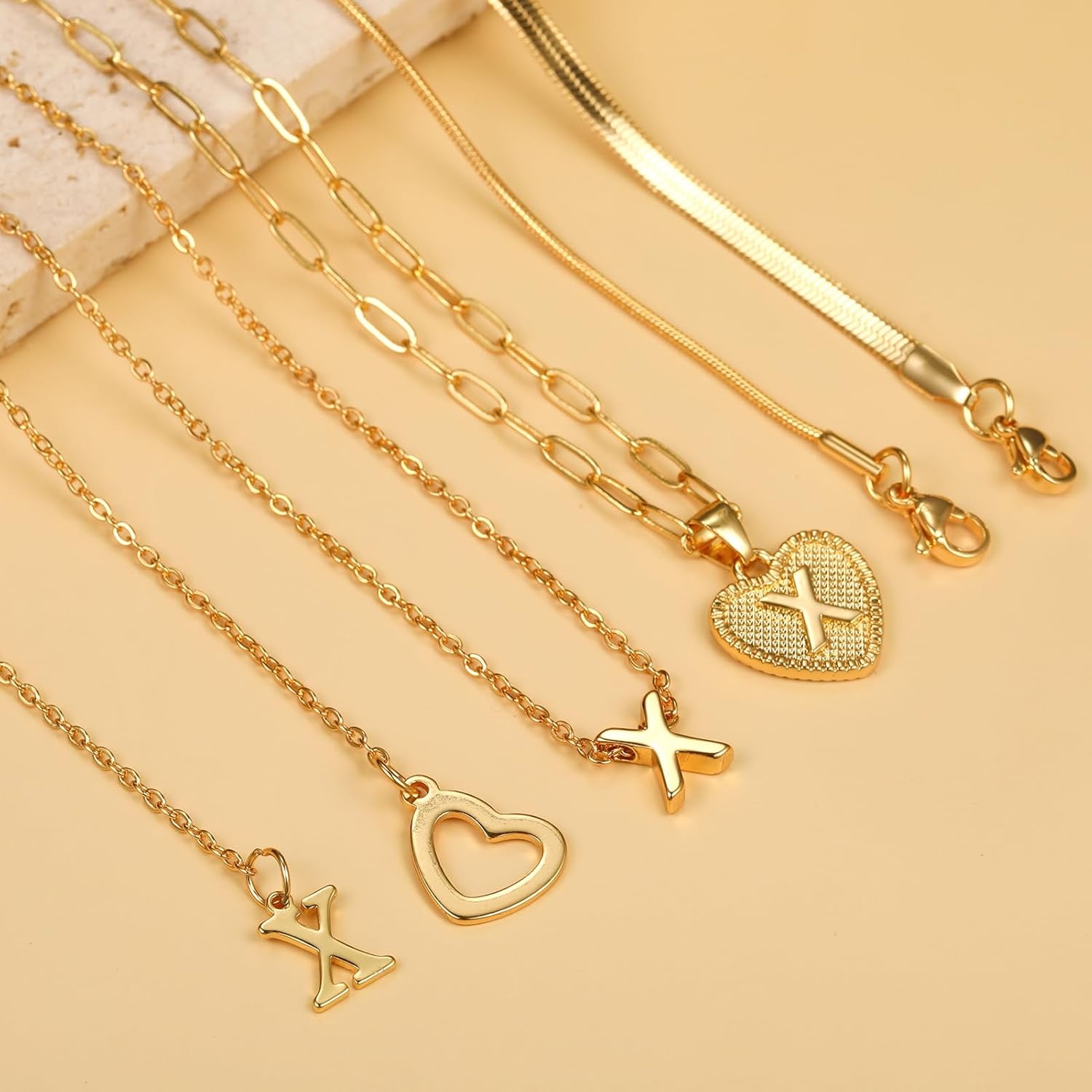 image:imageFAXHION Gold Initial Necklaces for Women 3 Pcs 14K Gold Plated Letter Heart Pendant Necklaces Dainty Gold Letter Necklace Set Layering Choker Necklace for GiftGold