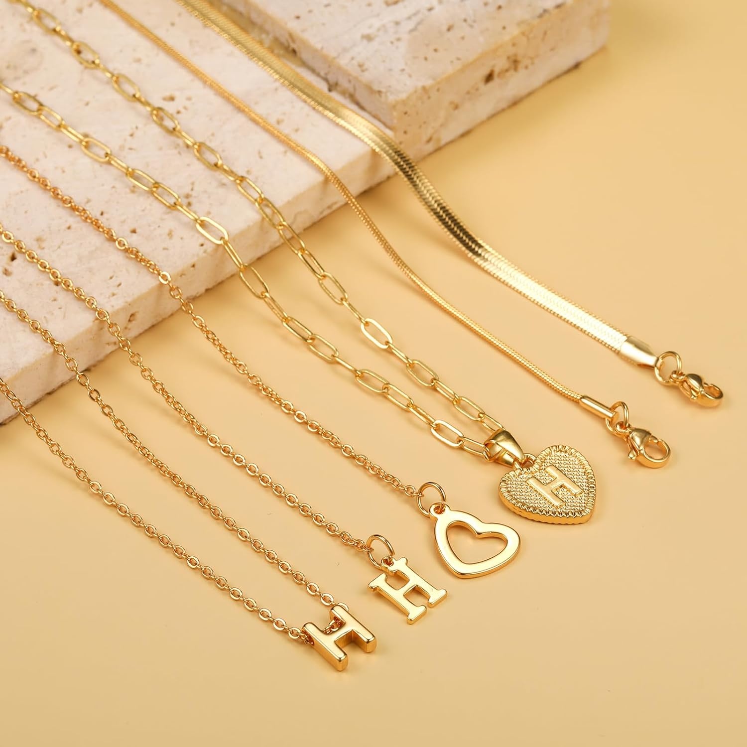 image:imageFAXHION Gold Initial Necklaces for Women 3 Pcs 14K Gold Plated Letter Heart Pendant Necklaces Dainty Gold Letter Necklace Set Layering Choker Necklace for GiftGold